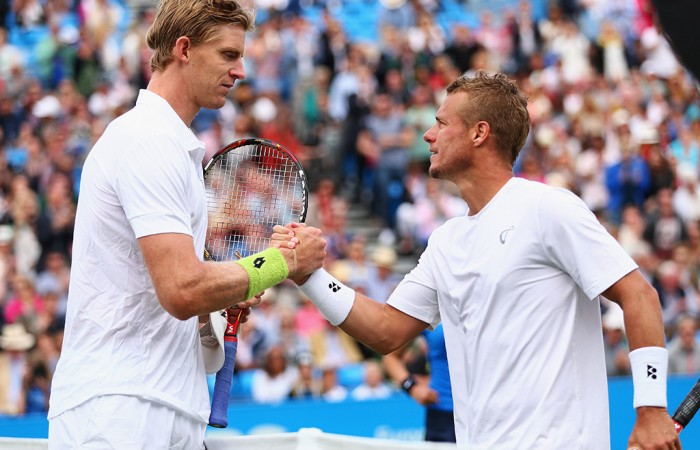 Lleyton Hewitt (R) shakes hands with Kevin Anderson after falling in their first-round match at the AEGON Championships at London's Queen's Club; Getty Images Lleyton Hewitt (R) shakes hands with Kevin Anderson after falling in their first-round match at the AEGON Championships at London's Queen's Club; Getty Images