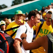 Qualifier John Millman is congratulated by Aussie fans after pushing Marcos Baghdatis to five sets in the second round; Getty Images