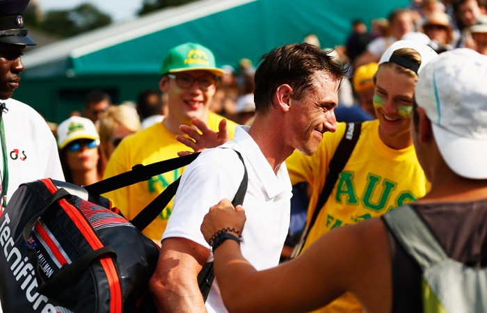 Qualifier John Millman is congratulated by Aussie fans after pushing Marcos Baghdatis to five sets in the second round; Getty Images