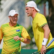 Lleyton Hewitt (L) and Sam Groth in doubles action for Australia in the Davis Cup quarterfinal against Kazakhstan in Darwin; Getty Images