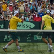Lleyton Hewitt (L) and John Peers celebrate a winning point during the doubles rubber of the Australia v United States Davis Cup World Group tie at Kooyong Lawn Tennis Club; Getty Images