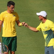 Bernard Tomic (L) and Australian captain Lleyton Hewitt during the reverse singles rubber of the Australia v United States Davis Cup World Group tie at Kooyong; Getty Images