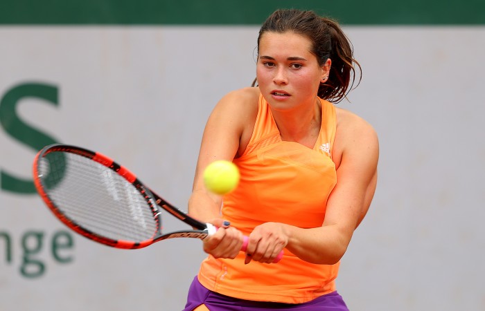 PARIS, FRANCE - JUNE 01:  Isabelle Wallace plays a backhand in her girls's singles match against Varvara Flink of Russia on day eight of the French Open at Roland Garros on June 1, 2014 in Paris, France.  (Photo by Clive Brunskill/Getty Images)