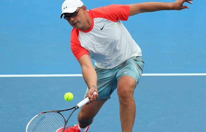 Andrew Florent in action at the Australian Open 2014 legends event; Getty Images