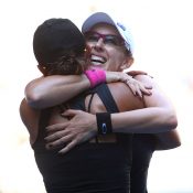 Anastasia Rodionova hugs sister Arina at Australian Open 2016; Getty Images