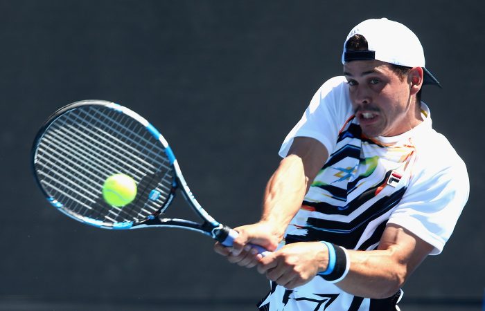 MELBOURNE, AUSTRALIA - JANUARY 11:  Alex Bolt of Australia plays a backhand in his 2017 Australian Open Qualifying match against Marius Copil of Romania at Melbourne Park on January 11, 2017 in Melbourne, Australia.  (Photo by Robert Prezioso/Getty Images)