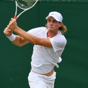 Blake Ellis in action in the boys' singles event at Wimbledon; Getty Images
