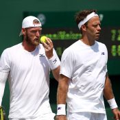 Sam Groth (L) and Robert Lindstedt compete in the men's doubles event at Wimbledon; Getty Images