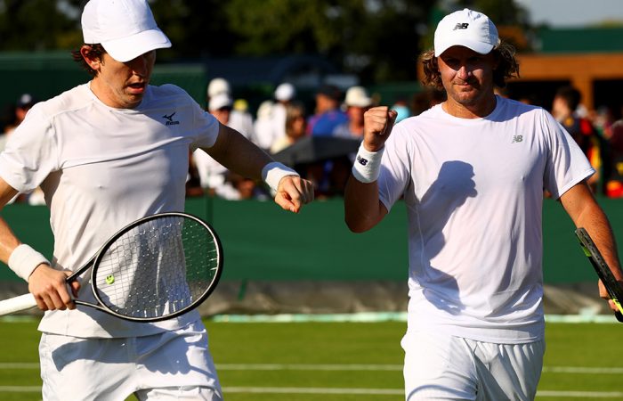 John-Patrick Smith (L) and Matt Reid in action in the men's doubles at Wimbledon; Getty Images