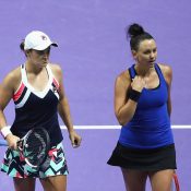 Ash Barty (L) and Casey Dellacqua in action at the 2017 WTA Finals; Getty Images