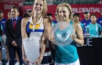 Daria Gavrilova (R) and Anastasia Pavlyuchenkova at the trophy presentation following the WTA Hong Kong Open final; Getty Images