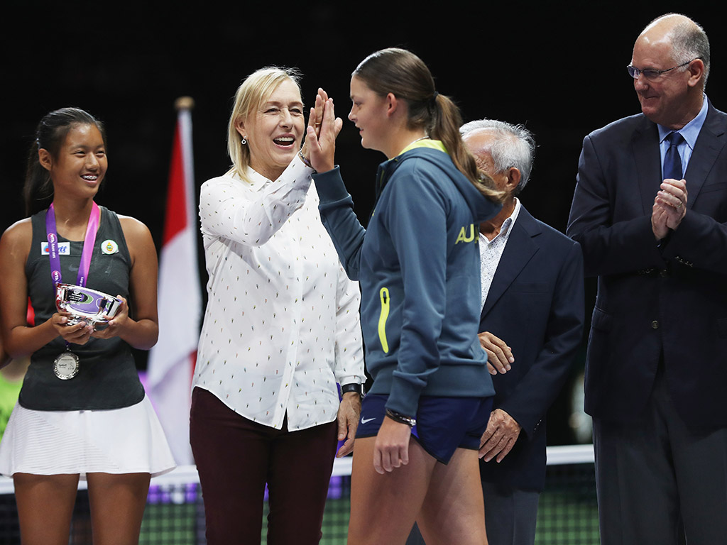 Martina Navratilova congratulates Megan Smith on winning the WTA Future Stars event in Singapore; Getty Images
