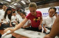 Ash Barty visited the Rong Hong School in Zhuhai; photo credit OSports