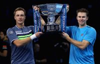 John Peers (R) and Henri Kontinen hoist the trophy after winning the ATP Finals for a second straight year in London; Getty Images