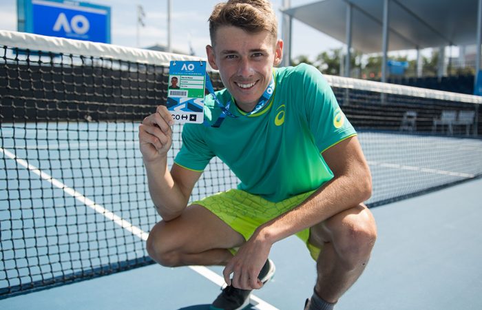 Alex De Minaur poses with his Australian Open 2018 player accreditation after winning the AO Play-off (photo credit Elizabeth Xue Bai)