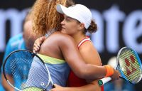 Osaka and Barty embrace at the net following their third round encounter.