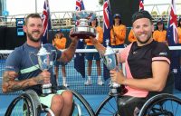 Heath Davidson and Dylan Alcott with their doubles title at Melbourne Park.