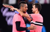 Nick Kyrgios and Grigor Dimitrov embrace after a remarkable match on Rod Laver Arena.