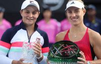 Ash Barty and Angelique Kerber hold their Sydney International trophies.