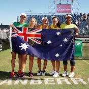 Australia's Fed Cup team of (L-R) Alicia Molik, Daria Gavrilova, Ash Barty, Casey Dellacqua and Destanee Aiava celebrate their World Group II first-round victory against Ukraine in Canberra; Getty Images