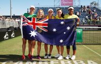 Australia's Fed Cup team of (L-R) Alicia Molik, Daria Gavrilova, Ash Barty, Casey Dellacqua and Destanee Aiava celebrate their World Group II first-round victory against Ukraine in Canberra; Getty Images