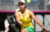 Australia's Ash Barty in action during her opening singles rubber against Lyudmyla Kichenok of Ukraine in Canberra; Getty Images