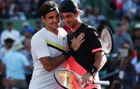 Thanasi Kokkinakis (R) is congratulated by Roger Federer (L) after winning through to the third round of the Miami Open; Getty Images