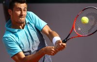 PARIS, FRANCE - MAY 25: Bernard Tomic of Australia plays a backhand during his French Open third round menÕs qualifying singles match against Goncalo Oliveira of Portugal at Roland Garros on May 25, 2018 in Paris, France. (Photo by Cameron Spencer/Getty Images)