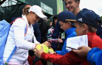 NOTTINGHAM, ENGLAND - JUNE 17: Ashleigh Barty of Australia leaves the court and signs autographs for fans after the Womens Singles Final during Day Nine of the Nature Valley Open at Nottingham Tennis Centre on June 17, 2018 in Nottingham, United Kingdom. (Photo by Ben Hoskins/Getty Images for LTA)