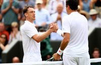 John Millman (L) shakes hands with Milos Raonic after losing their second-round match at Wimbledon; Getty Images