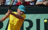 Australia's Alex De Minaur returns the ball to Austria's Dennis Novak during their Davis Cup Playoff tennis match between Austria and Australia on September 14, 2018 in Graz, Austria. (Photo by ERWIN SCHERIAU / APA / AFP) / Austria OUT (Photo credit should read ERWIN SCHERIAU/AFP/Getty Images)