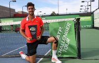 Thanasi Kokkinakis poses with the trophy after winning the Las Vegas Tennis Open (photo credit: ATP Challenger Tour)