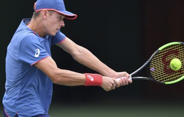 SHANGHAI, CHINA - OCTOBER 09:  Alex De Minaur of Australia returns a shot to Vasek Pospisil of Canada  during the 2018 Rolex Shanghai Masters on Day 3 at Qi Zhong Tennis Centre on October 97, 2018 in Shanghai, China.  (Photo by Tao Zhang/Getty Images)