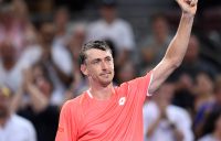 John Millman celebrates his first-round victory over Tennys Sandgren at the Brisbane International (Getty Images)