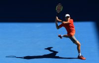 Home charge Alex de Minaur strikes a backhand during his opening round.