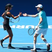 Astra Sharma (L) and John-Patrick Smith in action in the mixed doubles quarterfinals at the Australian Open (Getty Images)
