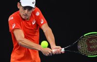 MELBOURNE, AUSTRALIA - JANUARY 18: Alex De Minaur of Australia plays a backhand in his third round match against Rafael Nadal of Spain during day five of the 2019 Australian Open at Melbourne Park on January 18, 2019 in Melbourne, Australia. (Photo by Quinn Rooney/Getty Images)