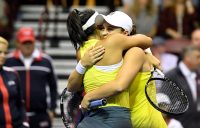 Ash Barty (R) embraces Priscilla Hon after the duo won the doubles rubber to give Australia a Fed Cup victory over the United States (Getty Images)