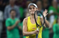 Ash Barty celebrates her victory over Victoria Azarenka in the second singles rubber of the Australia v Belarus Fed Cup semifinal in Brisbane (Getty Images)