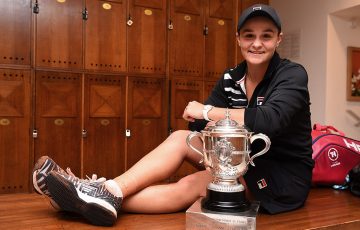 PARIS, FRANCE - JUNE 08: Ashleigh Barty of Australia celebrates victory with the winners trophy in the dressing room following the ladies singles final match against Marketa Vondrousova of The Czech Republic during Day fourteen of the 2019 French Open at Roland Garros on June 08, 2019 in Paris, France. (Photo by Corinne Dubreuil/FFT-Pool/Getty Images)