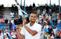 Nick Kyrgios hoists his trophy after winning the ATP title in Washington DC (Getty Images)