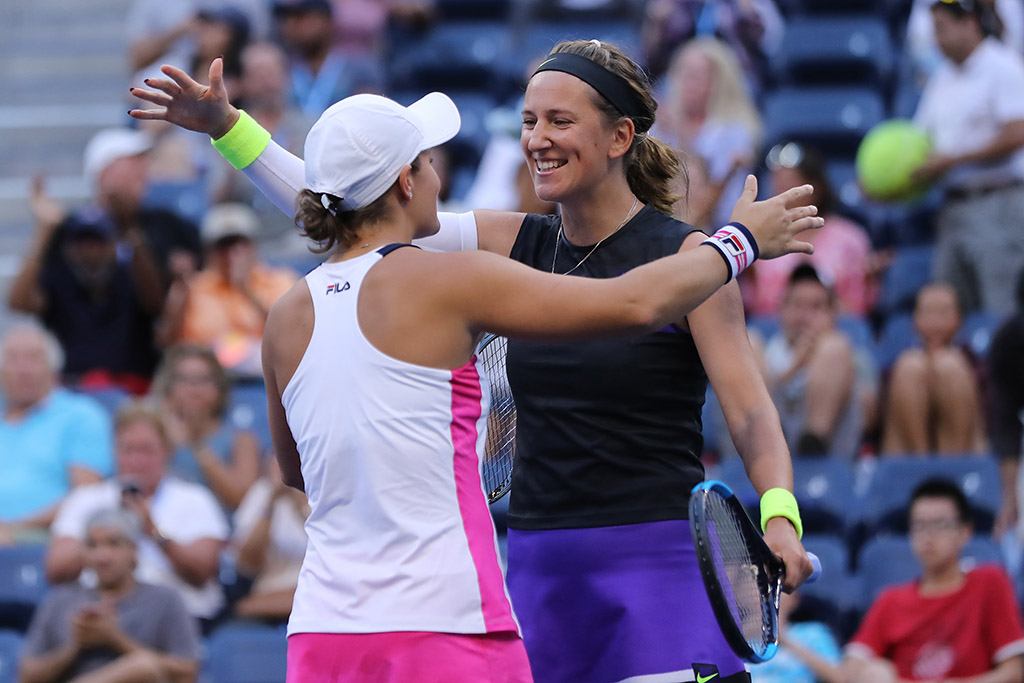 Ash Barty (L) and Victoria Azarenka celebrate their US Open quarterfinal victory over No.1 seeds Timea Babos and Kristina Mladenovic (Getty Images)