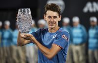 Alex de Minaur hoists the trophy after winning the Sydney International ATP title. (Getty Images)