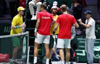 Canada's Vasek Pospisil (L) and Denis Shapovalov shake hands with Australia's John Peers (L) and Jordan Thompson after winning the decisive doubles rubber in the quarterfinals in Madrid. (Getty Images)