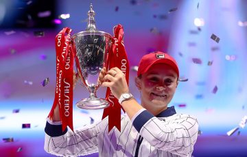 Ash Barty poses with the Billie Jean King Trophy after winning the WTA Finals in Shenzhen. (Getty Images)