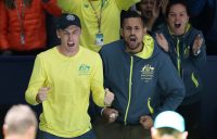 John Millman (L) and Nick Kyrgios cheer on Alex de Minaur during Australia's Davis Cup tie against Belgium in Madrid. (Getty Images)