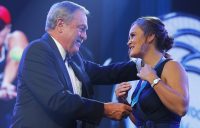 Ash Barty (R) is presented with the 2019 Newcombe Medal by John Newcombe. (Getty Images)