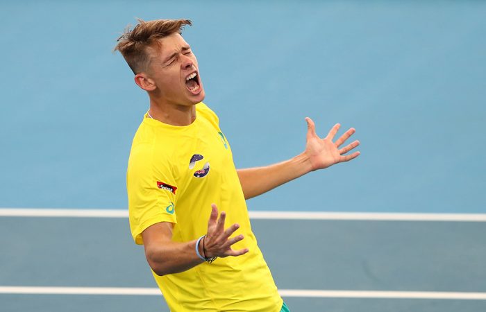 Australia's Alex de Minaur celebrates his victory over Canadian Denis Shapovalov at the ATP Cup in Brisbane. (Getty Images)