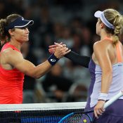 Sam Stosur (L) congratulates Caty McNally after the American won their first-round match at Australian Open 2020. (Getty Images)