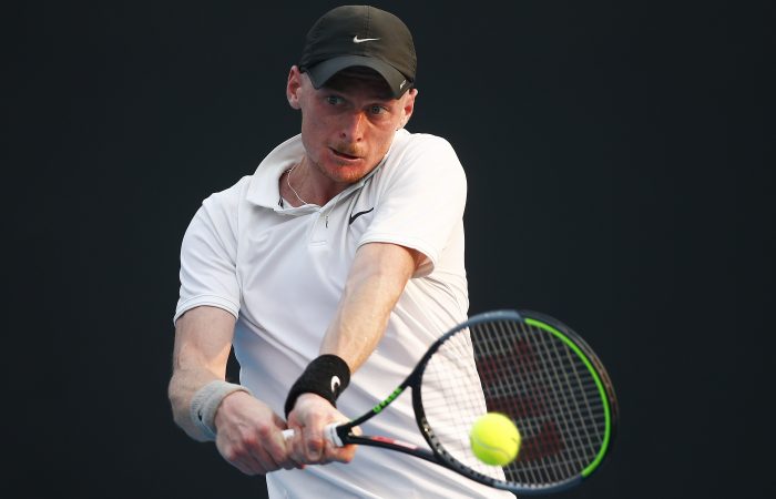 MELBOURNE, AUSTRALIA - JANUARY 14: Blake Mott of Australia plays a backhand in his match against Pedro Sousa of Portugal during 2020 Australian Open Qualifying at Melbourne Park on January 14, 2020 in Melbourne, Australia. (Photo by Daniel Pockett/Getty Images)